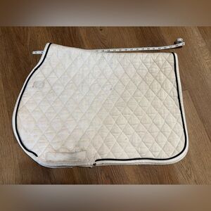 White saddle pad with black trim
